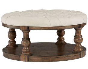 Wynton Round Upholstered Cocktail Table in Cognac