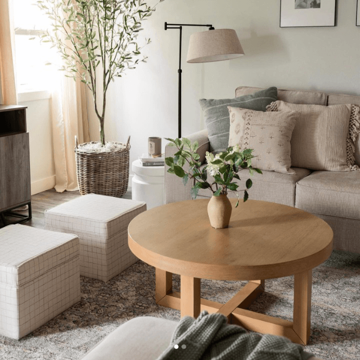 circle wooden coffee table in a living room