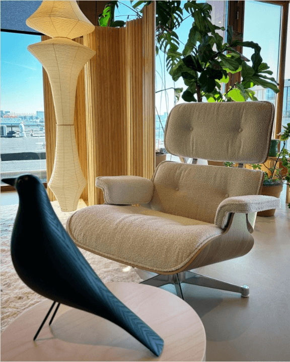 lounge chair with bird decor on table