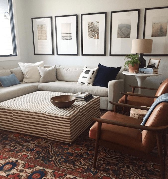 living room sofa with accent chairs and ottoman