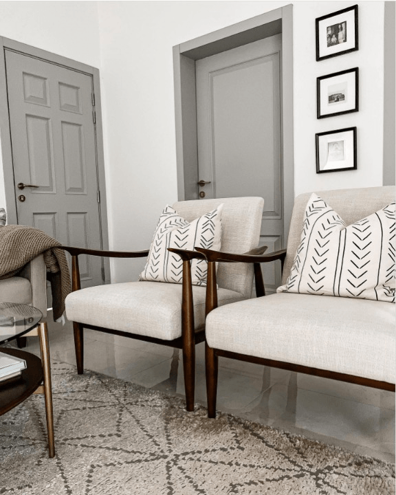 two accent chairs in a living room